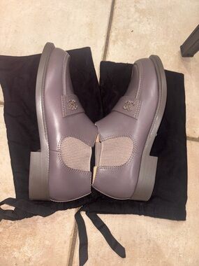 CHANEL Women's Leather Loafers with Gold Logo